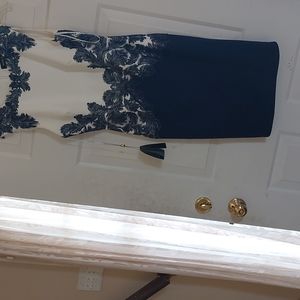 Beautiful dress for a wedding, cocktail party, etc. Nicely lined. Navy/white